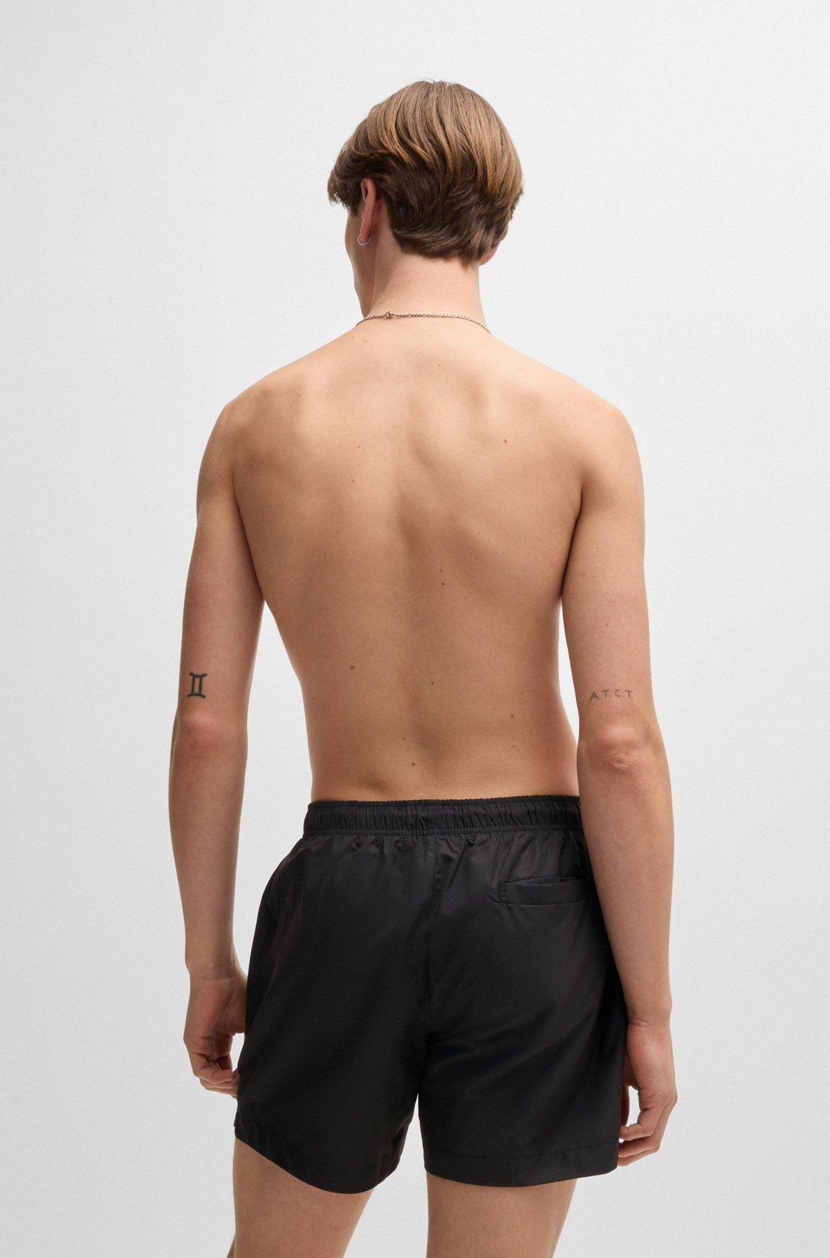 Swim shorts with cat graphic print Product Image
