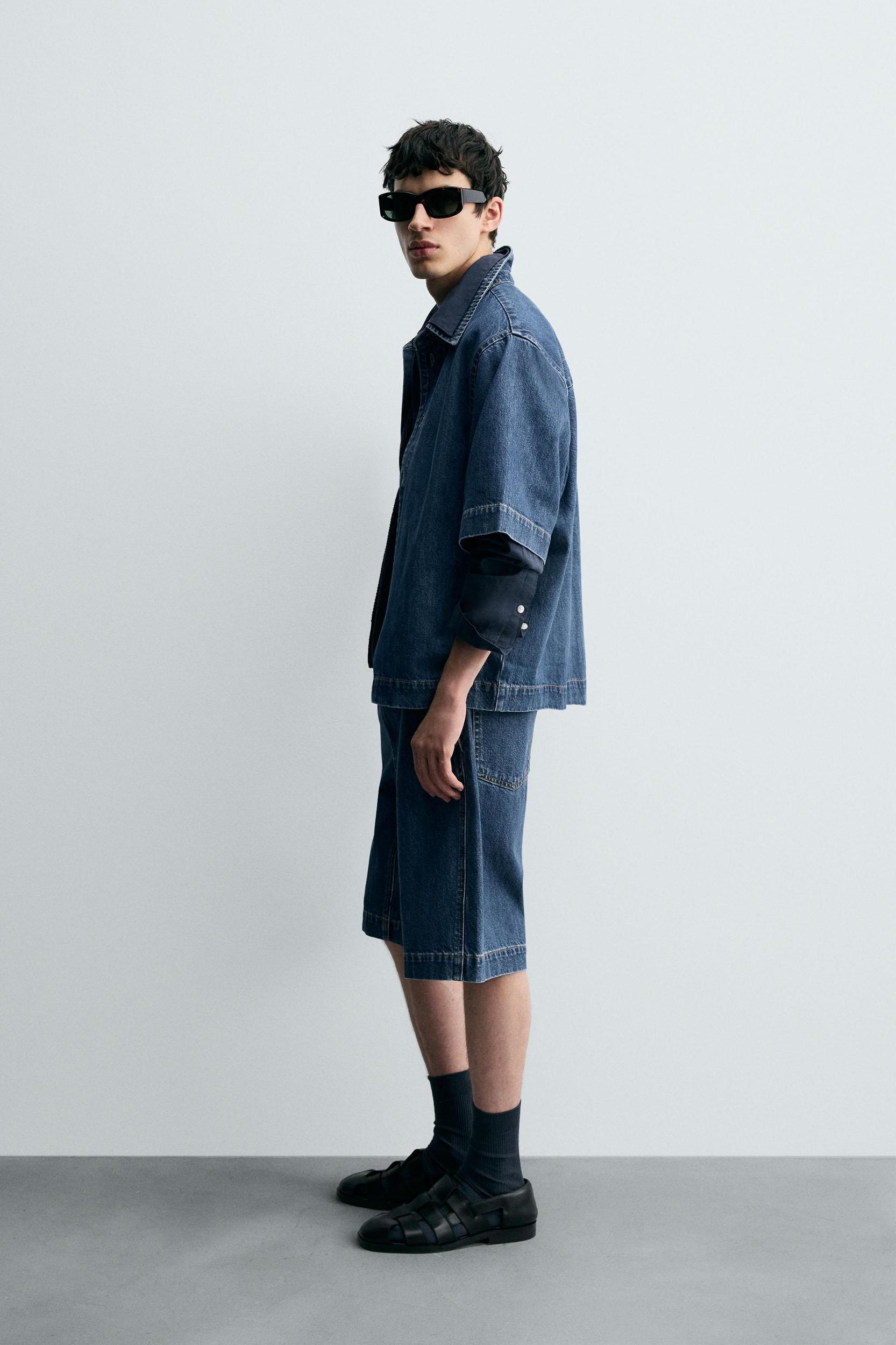 PLEATED RELAXED FIT DENIM SHORTS Product Image