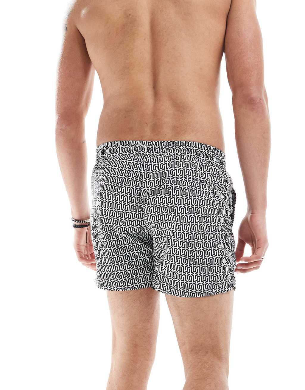 Aray geo print swim shorts in black and white Product Image