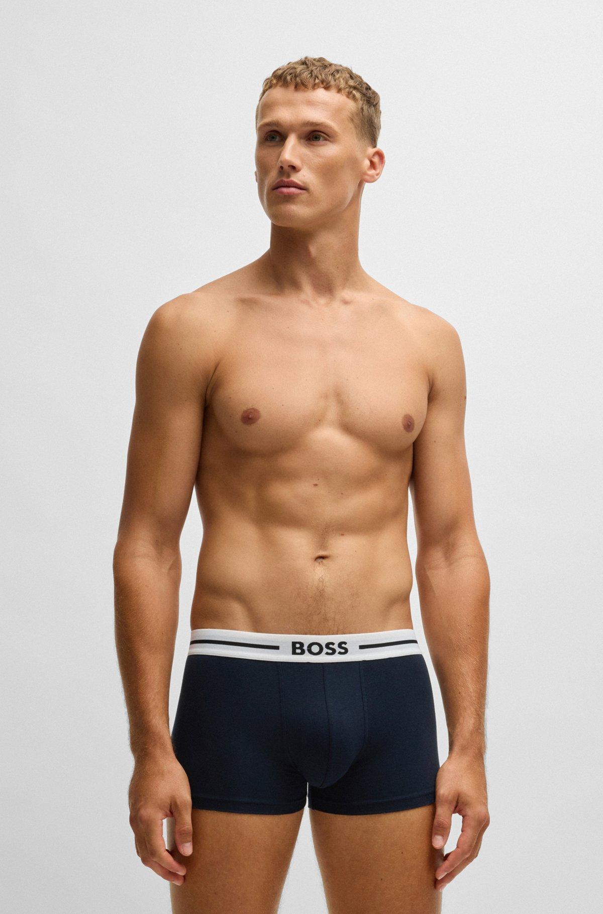 Three-pack of stretch-cotton plain and monogrammed trunks  Product Image