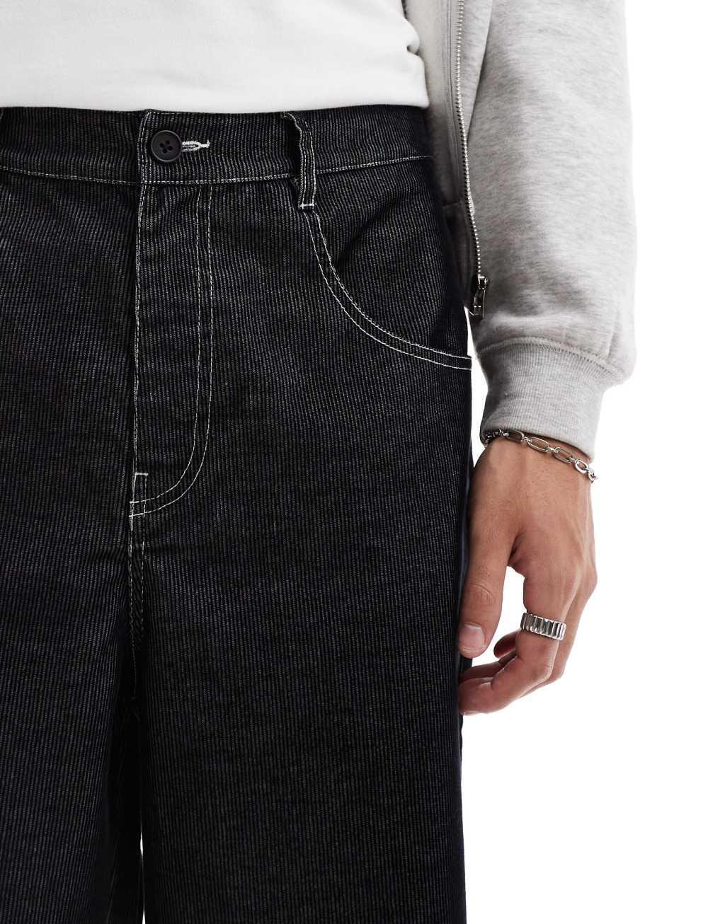 ASOS DESIGN super baggy corduroy pants with contrast stitch in black Product Image