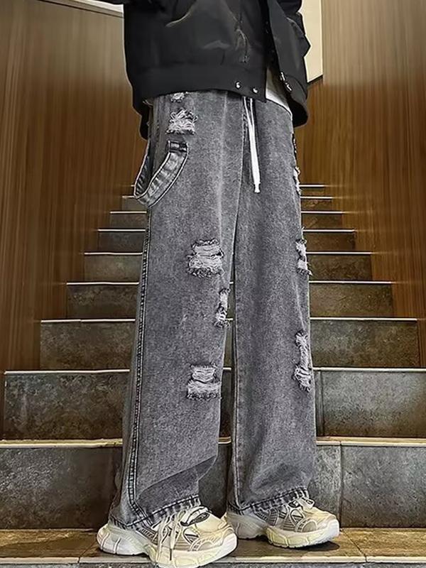 Men's Vintage Cross Embroidery Ripped Loose Jeans Product Image