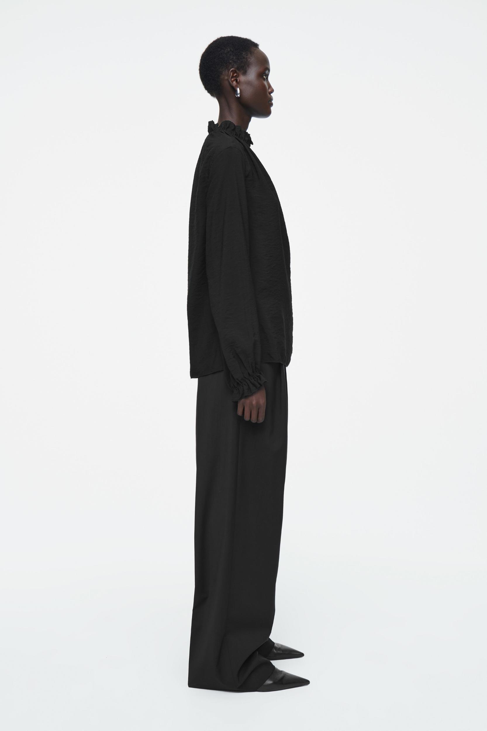 RUFFLED HIGH-NECK BLOUSE Product Image