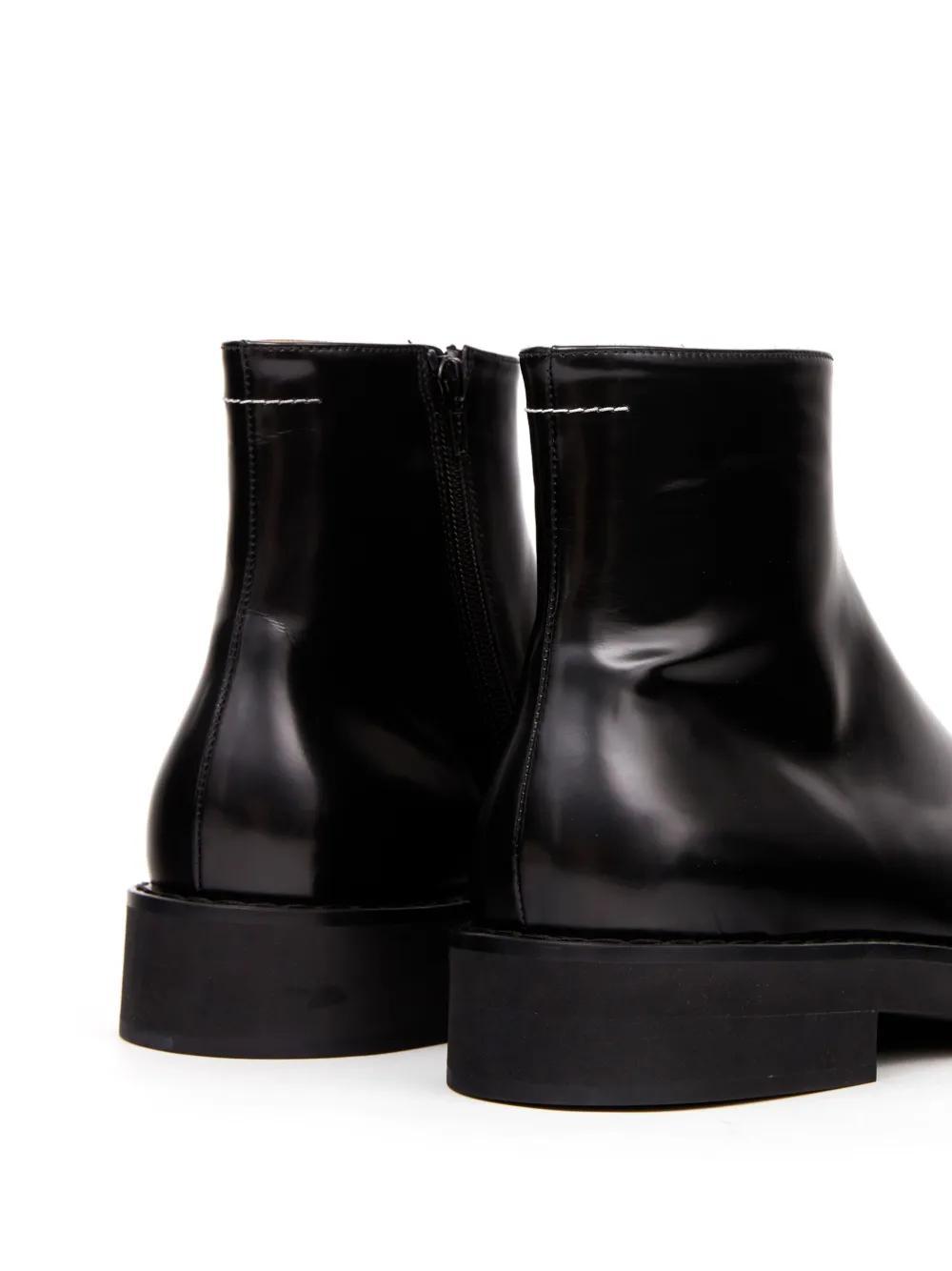 Trunk leather ankle boots Product Image