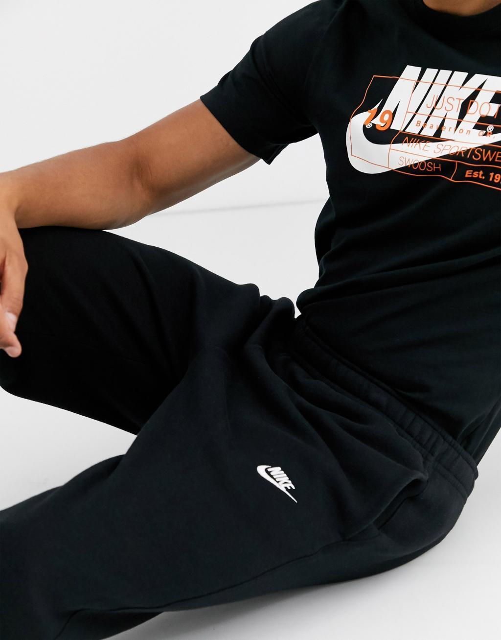 Nike Club straight fit sweatpants in black Product Image