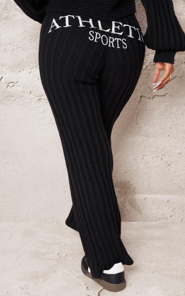 Petite Black Athletic Sport Embroidered Knit Flared Pants Product Image