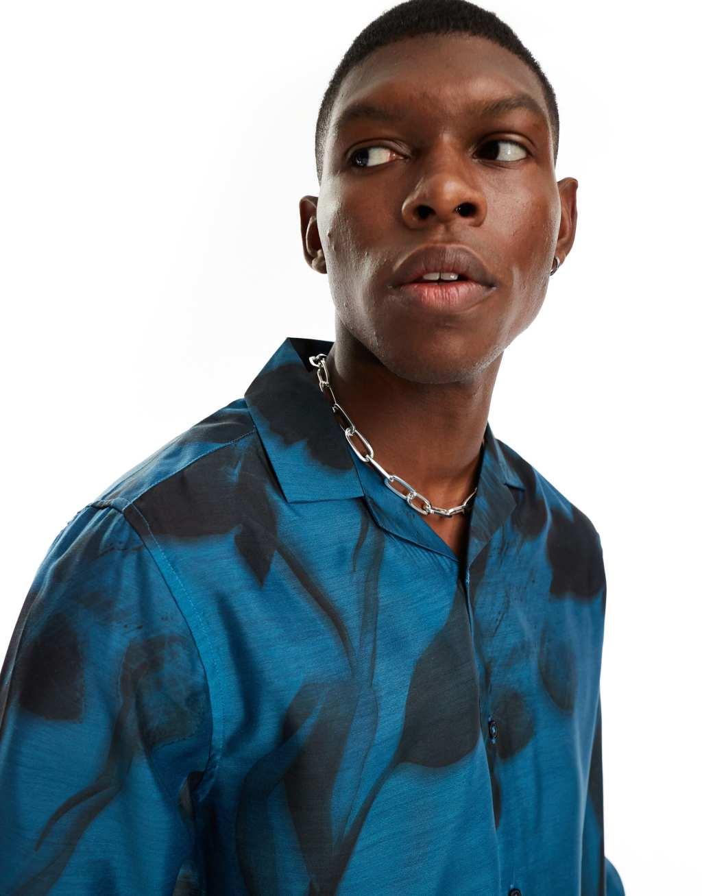 ASOS DESIGN relaxed revere shirt with faded floral print in blue  Product Image