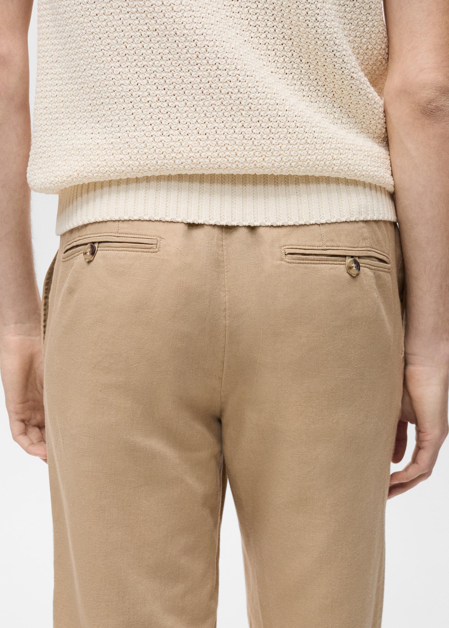 Slim-fit trousers with drawstring - Men | MANGO USA Product Image