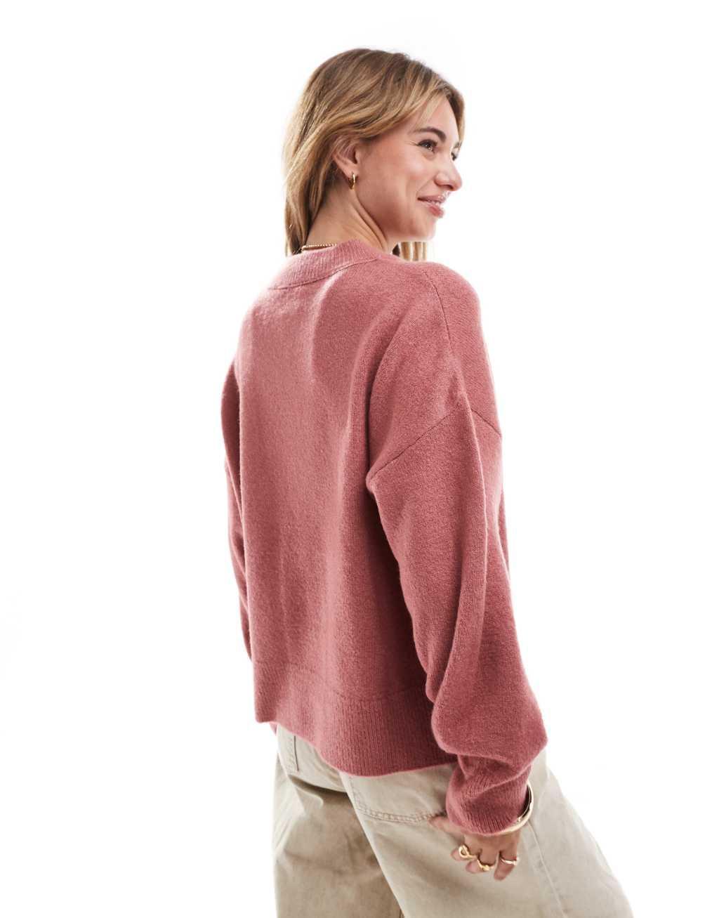 ASOS DESIGN knitted crew neck boxy sweater in pink Product Image