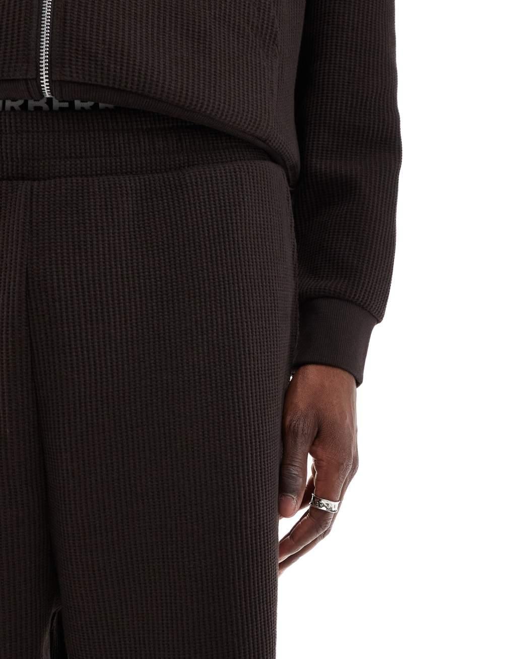 ASOS DESIGN oversized waffle wide leg sweatpants in brown Product Image