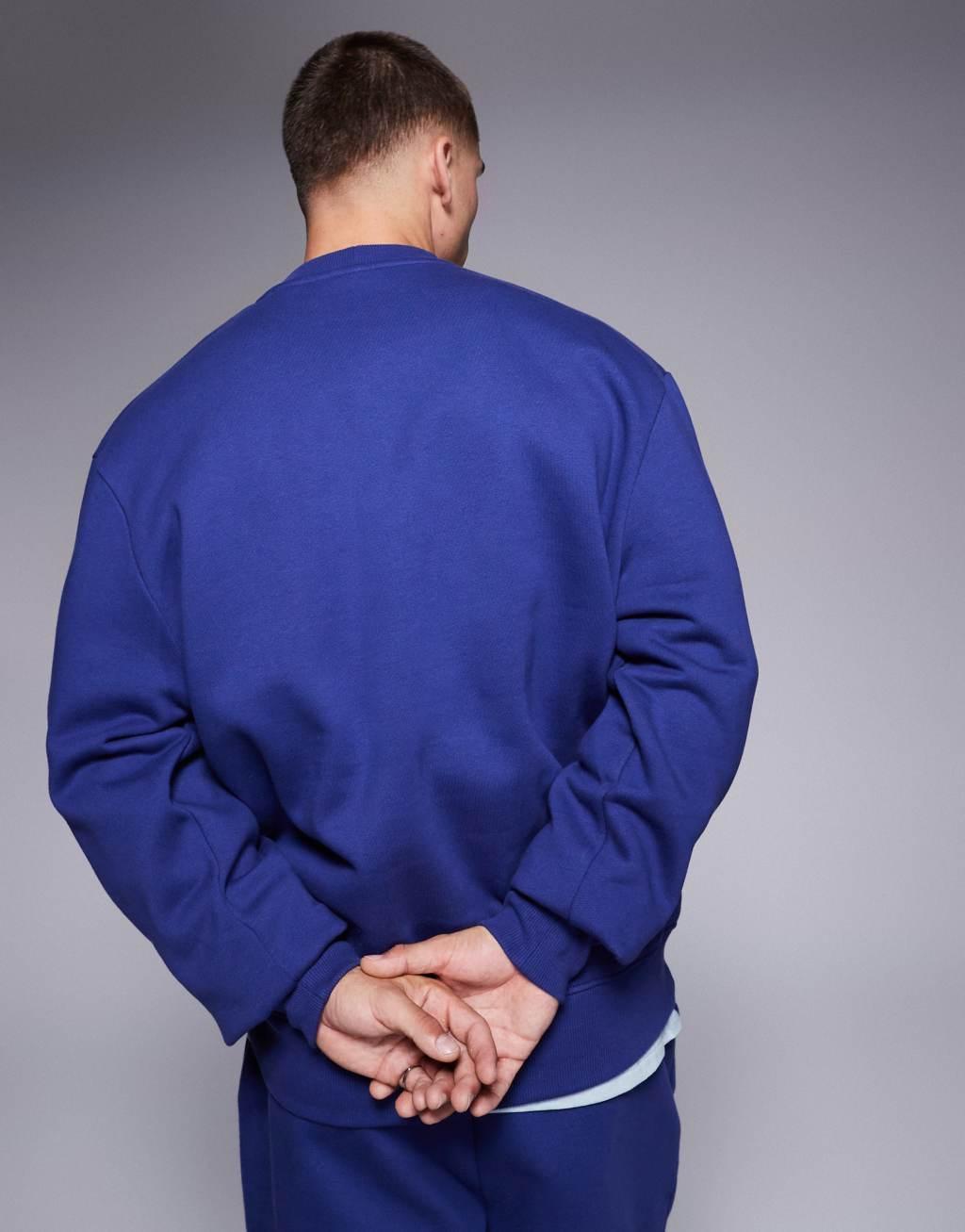 ASOS DESIGN premium heavyweight oversized sweatshirt in blue Product Image