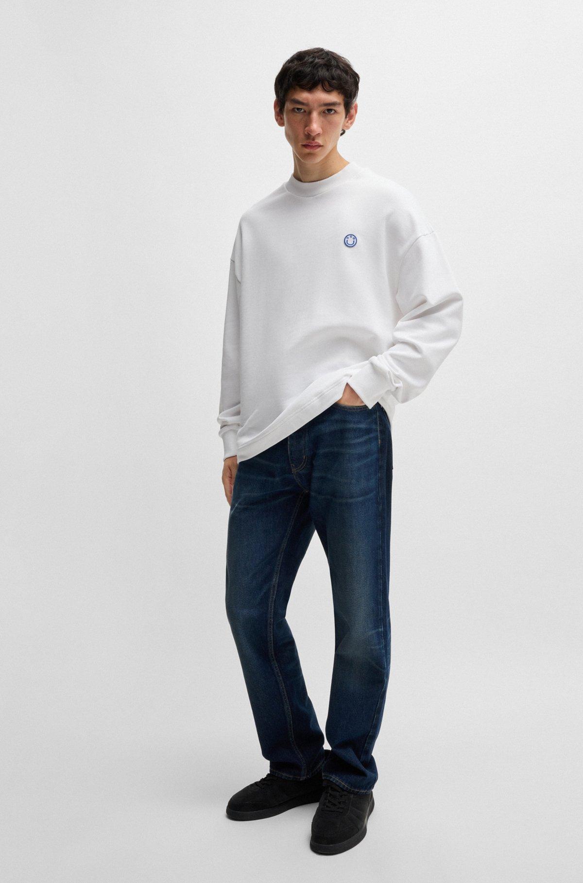 Cotton-terry sweatshirt with Happy HUGO logo Product Image