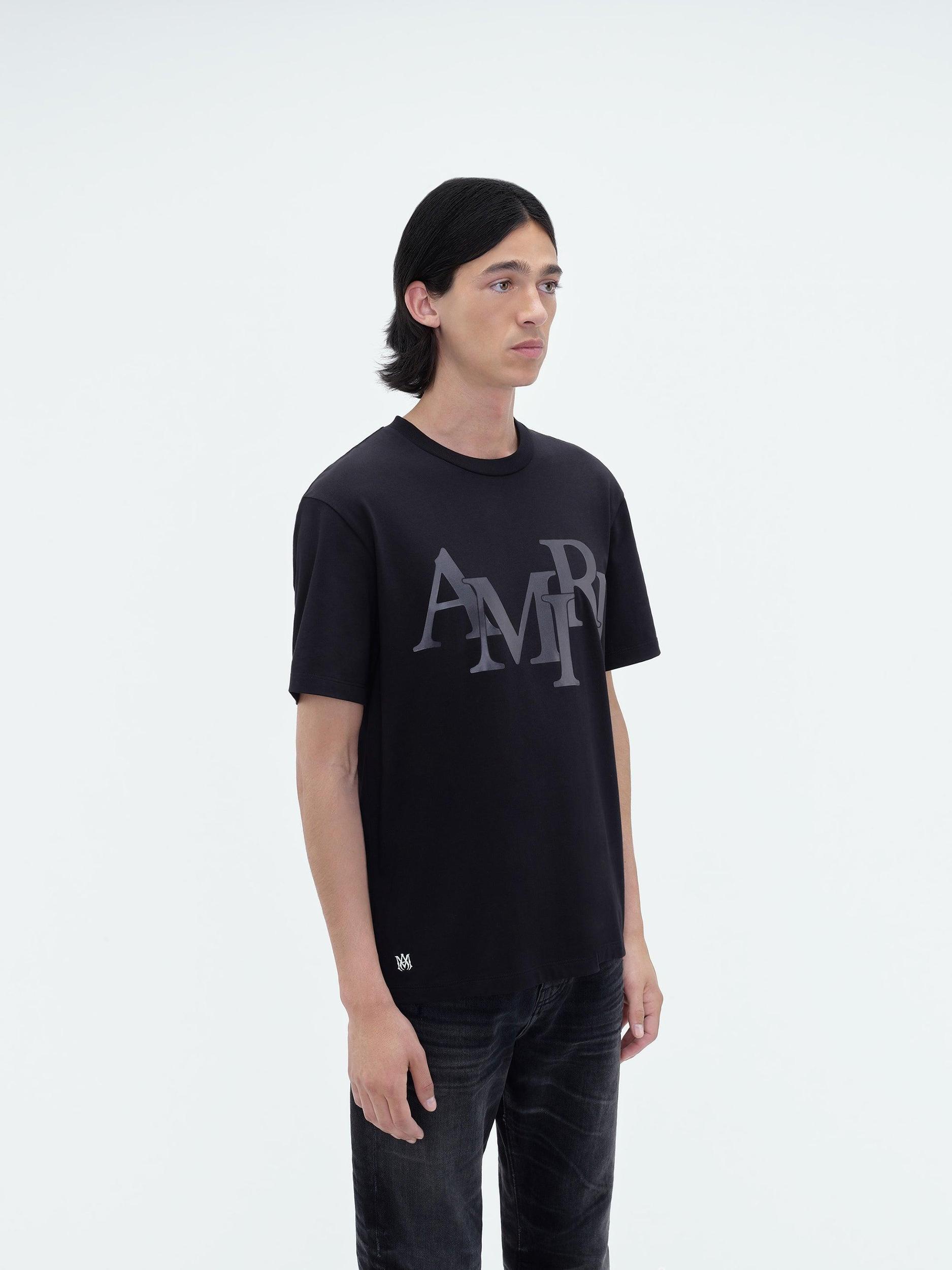 AMIRI STAGGERED LOGO TEE - Black Male Product Image