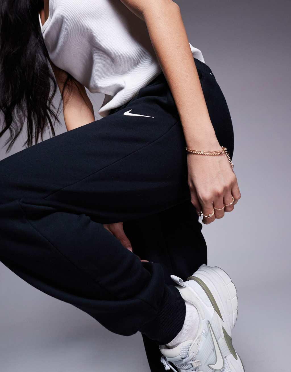 Nike Phoenix Fleece cuffed sweatpants in black Product Image