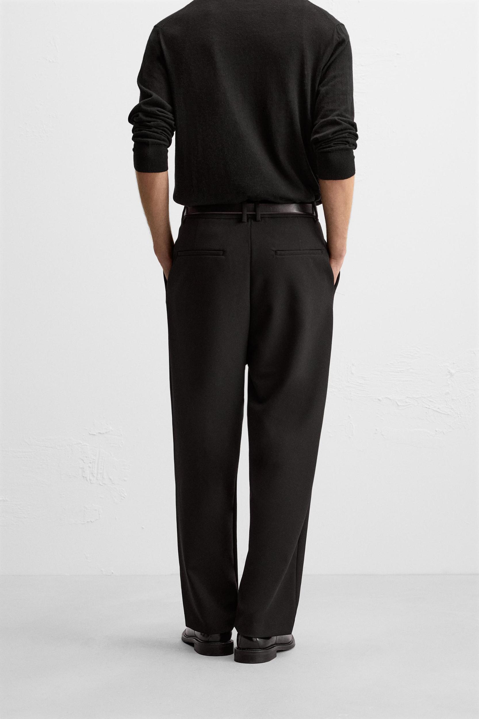 RELAXED FIT PLEATED PANTS Product Image