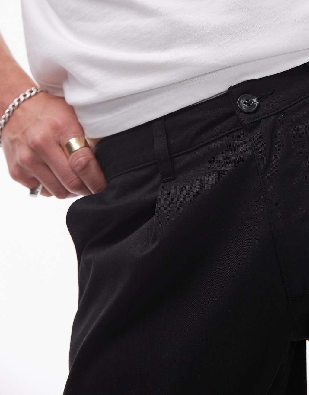 Topman twin pleated tapered pants in black Product Image