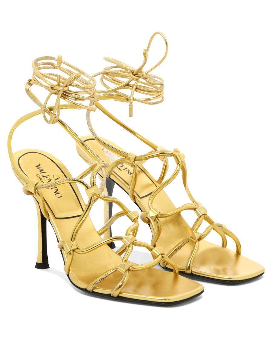 VALENTINO GARAVANI Rockstud Net Heel Sandals In Antique Brass Product Image