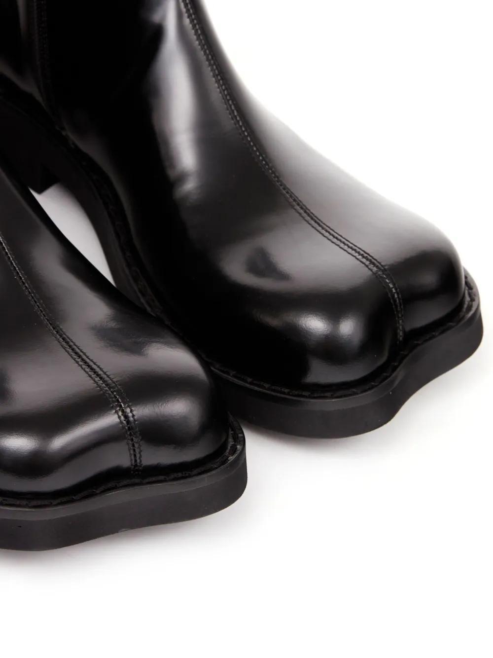 Trunk leather ankle boots Product Image