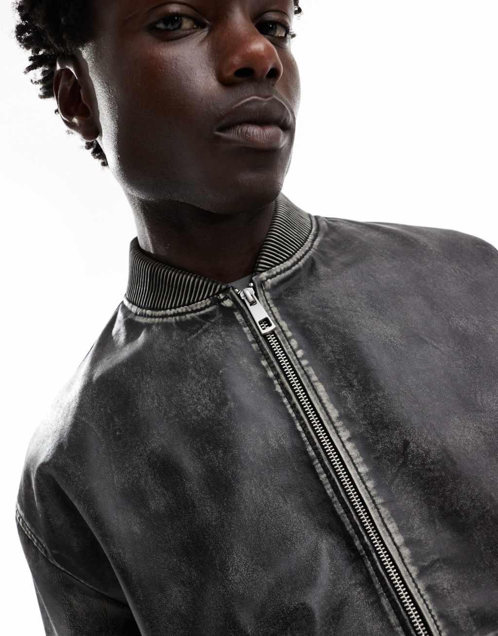 ASOS DESIGN premium real leather oversized distressed bomber jacket in black Product Image