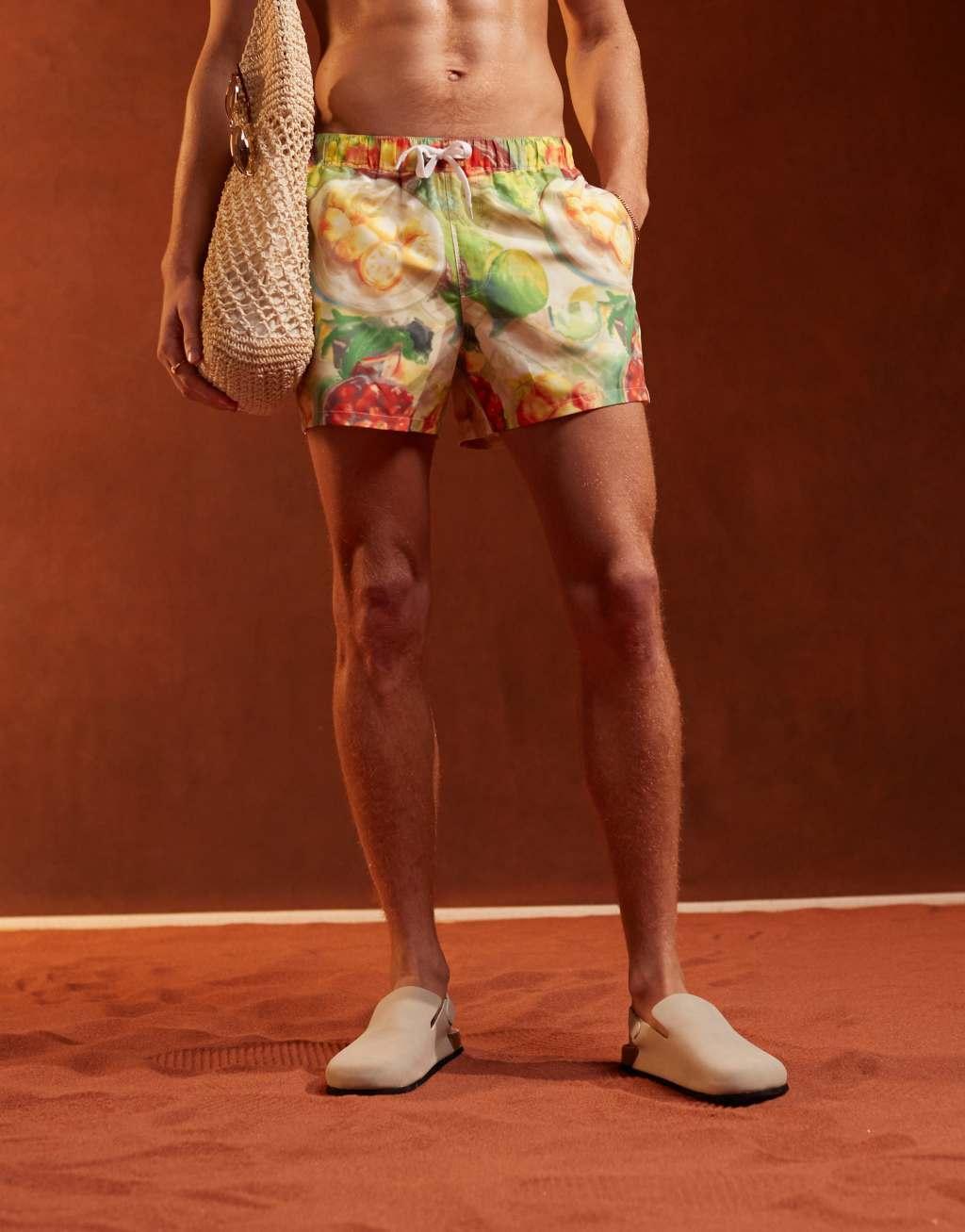 ASOS DESIGN swim shorts in short length in fruit print Product Image