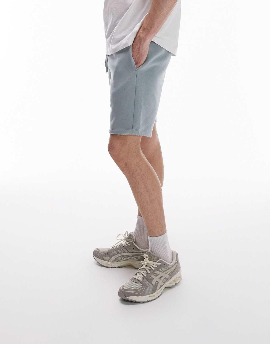 Topman classic fit jersey shorts with raw hem in sage Product Image