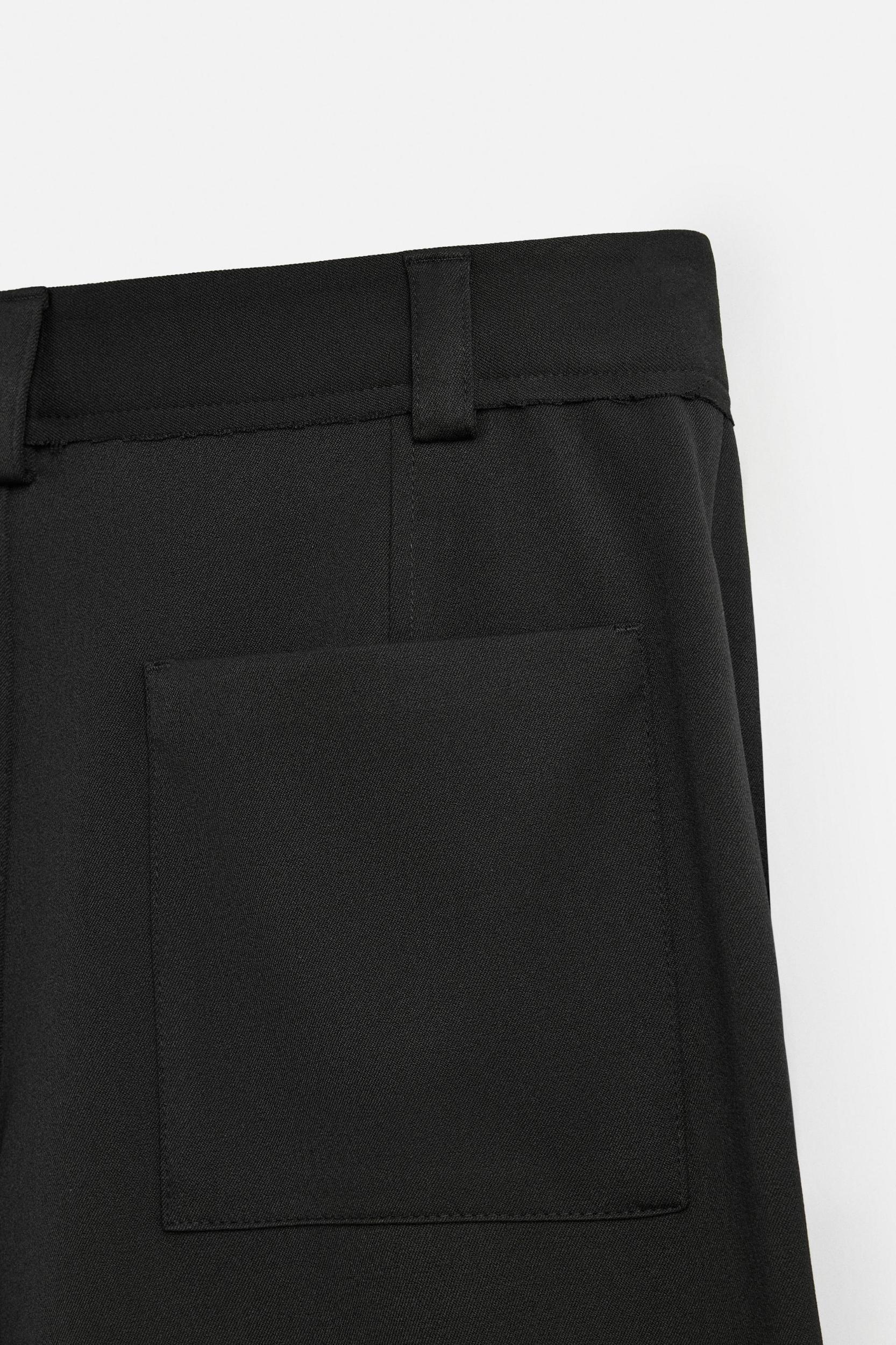 TEXTURED PLEATED SHORTS Product Image