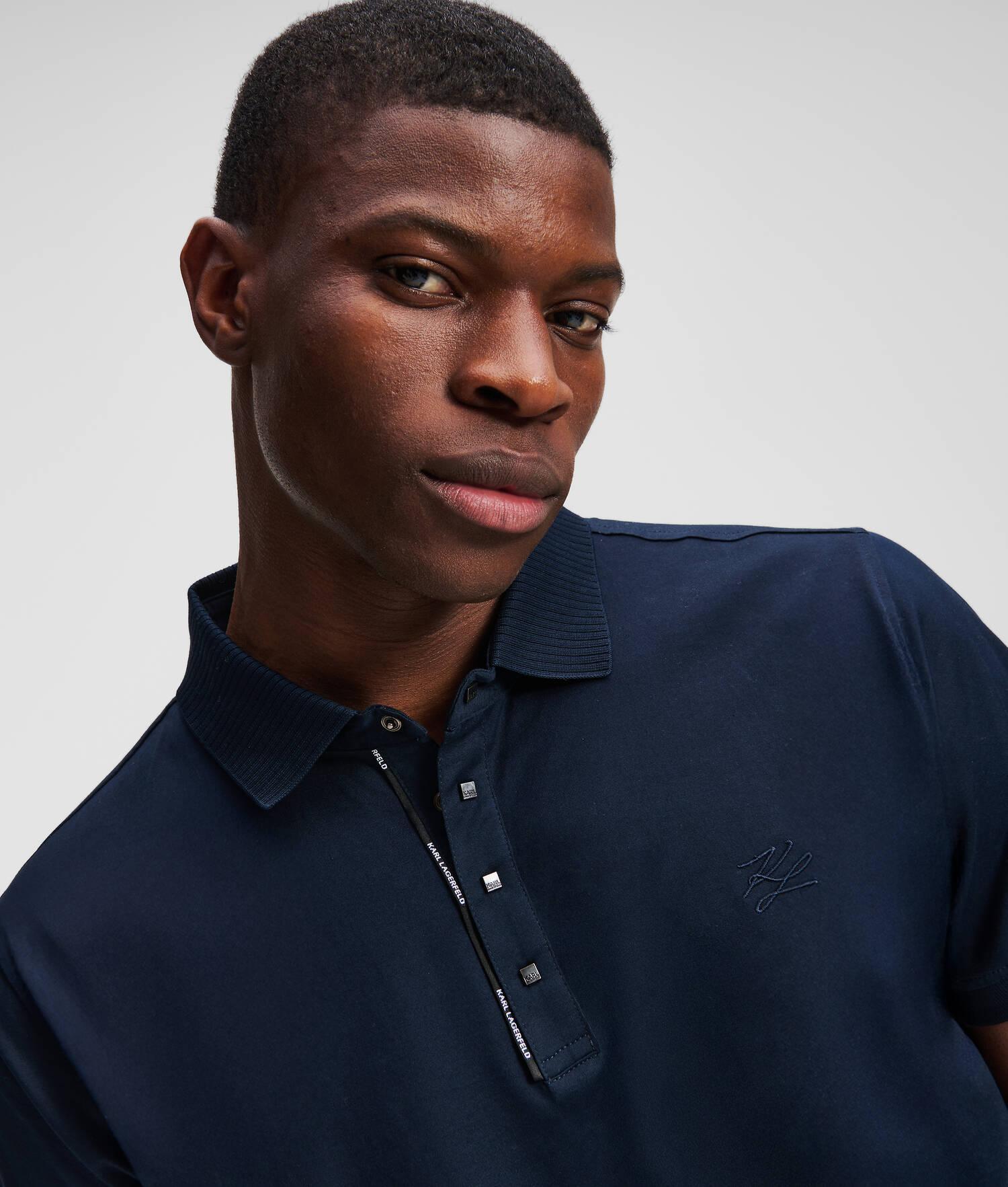 PRESS BUTTON POLO SHIRT Product Image