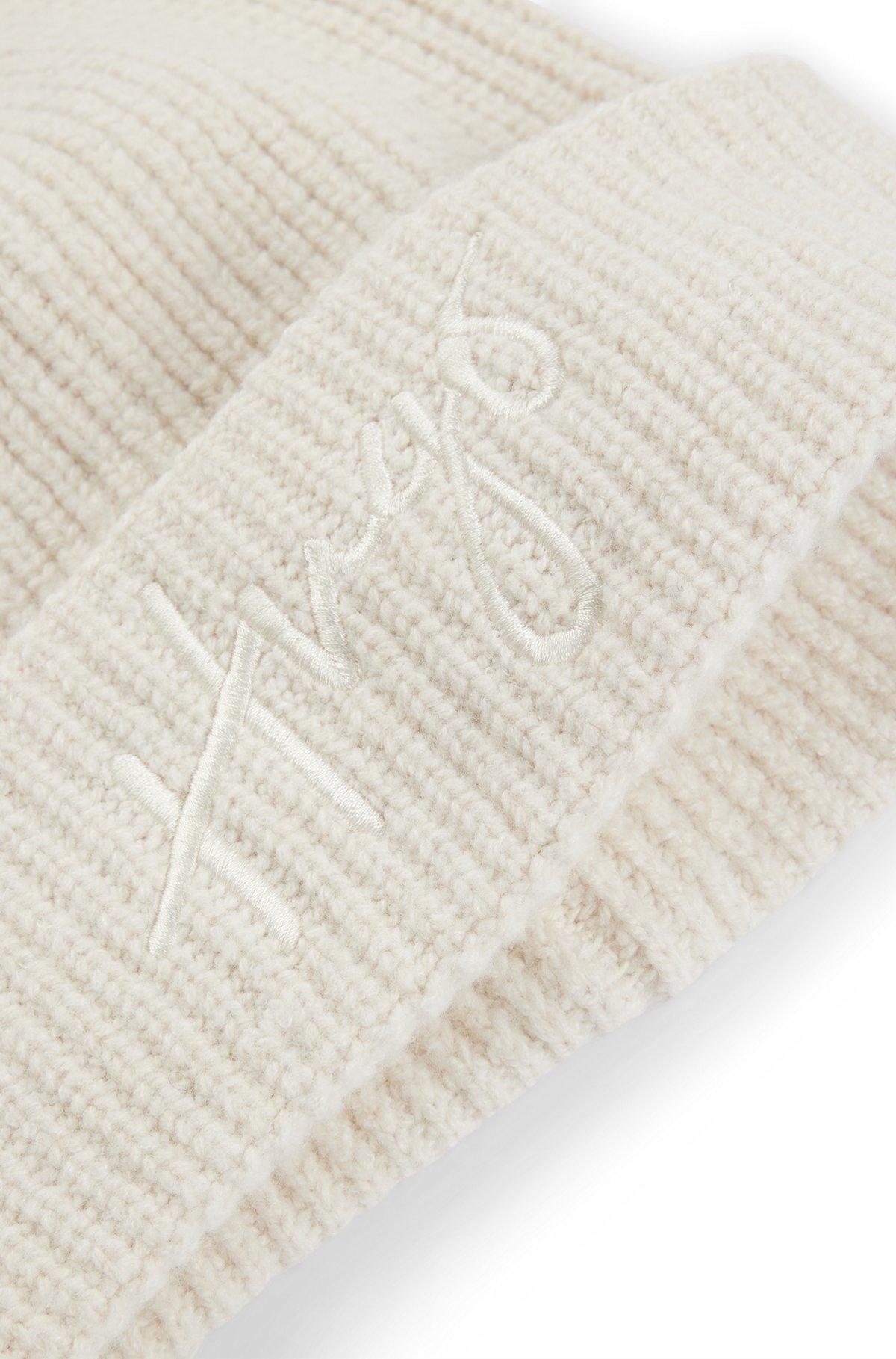 Ribbed beanie hat with embroidered handwritten logo Product Image