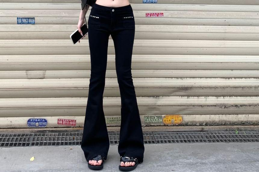 Mock Neck Plain Ribbed Knit Crop Tank Top / Low Rise Studded Flared Jeans Product Image