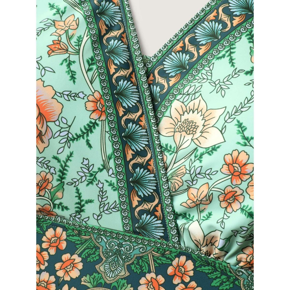 Plus Size Breezy Floral Print Ruffled Swim Top Women's Swimwear Mint Beach Ruffles High stretch Skinny Overlap Collar Curve Swim Tops BloomChic 28/5X Product Image