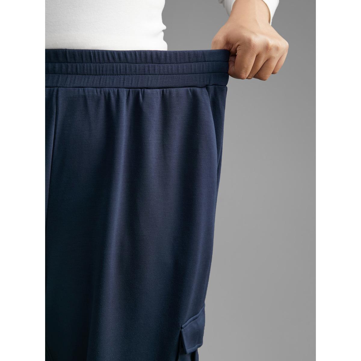 Plus Size Mid Rise Patched Pocket Carrot Pants Women Indigo Casual Loose Mid Rise Everyday Pants BloomChic 14-16/1X Product Image