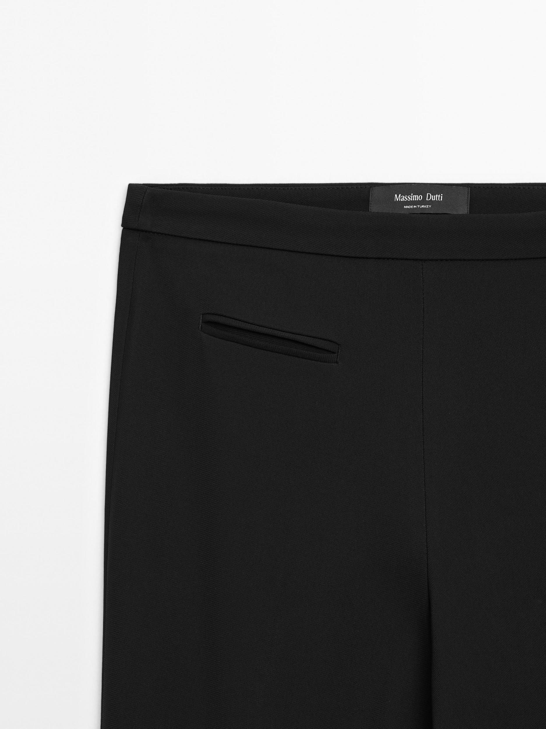 Flared trousers with pocket Product Image