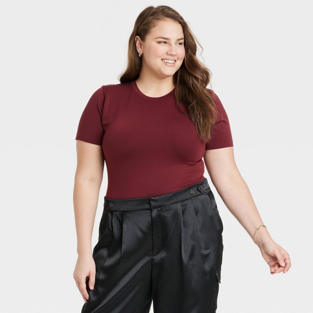 Women's Slim Fit Short Sleeve Seamless Baby T-Shirt - A New Day™ Black S: Lightweight Nylon Spandex Pullover, Crew Neck Jersey Product Image