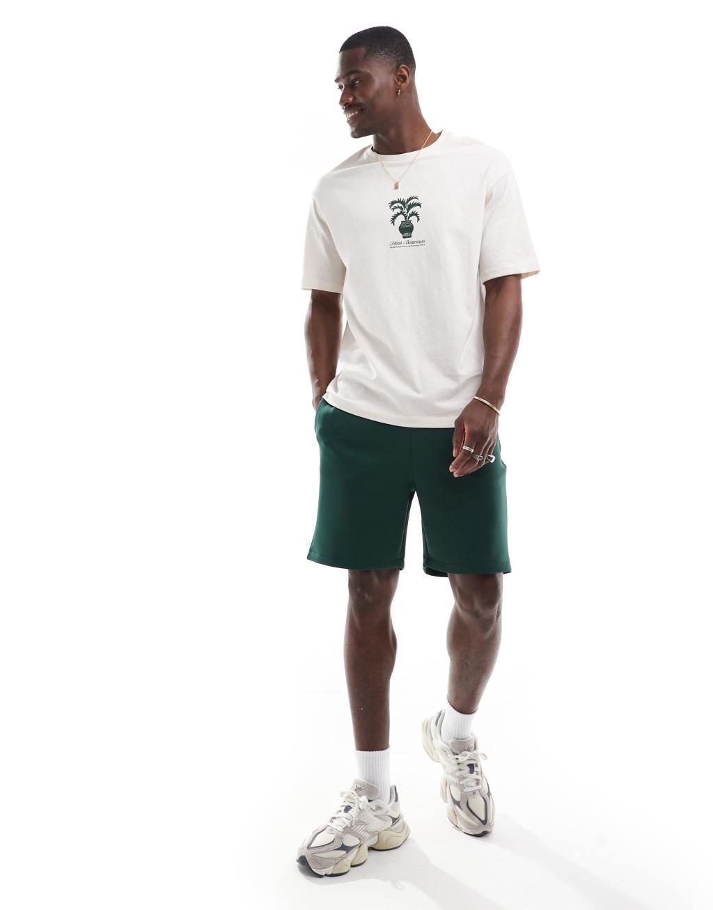 Selected Homme oversized t-shirt with central plant print in cream Product Image