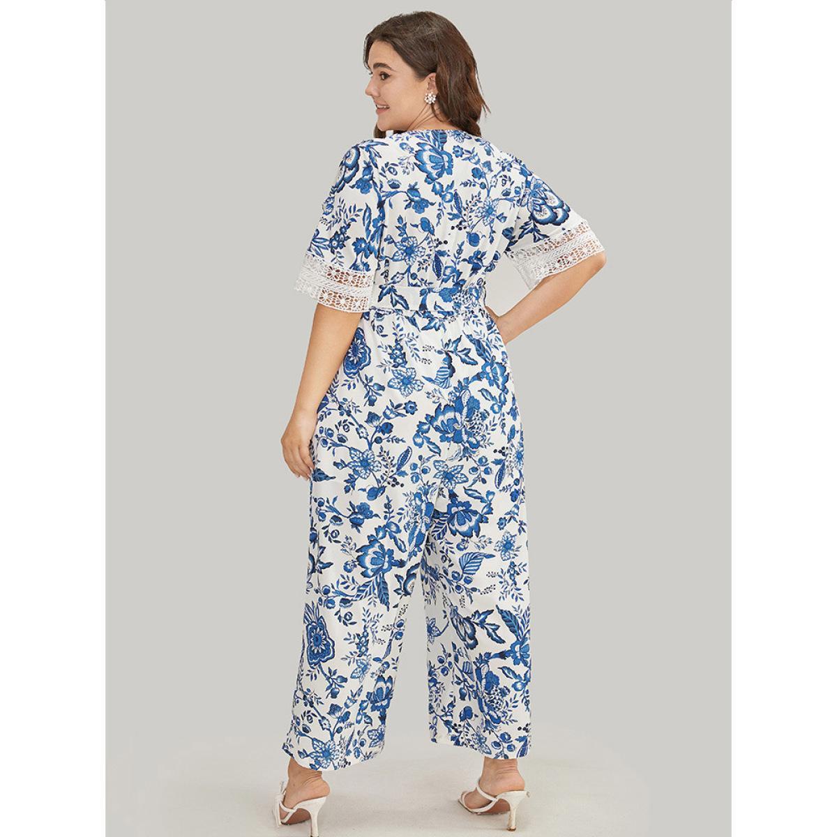 Plus Size Navy Floral Belted Pocket Lace Trim Wrap Jumpsuit Women Vacation Short sleeve V-neck Dailywear Loose Jumpsuits BloomChic 30/6X Product Image