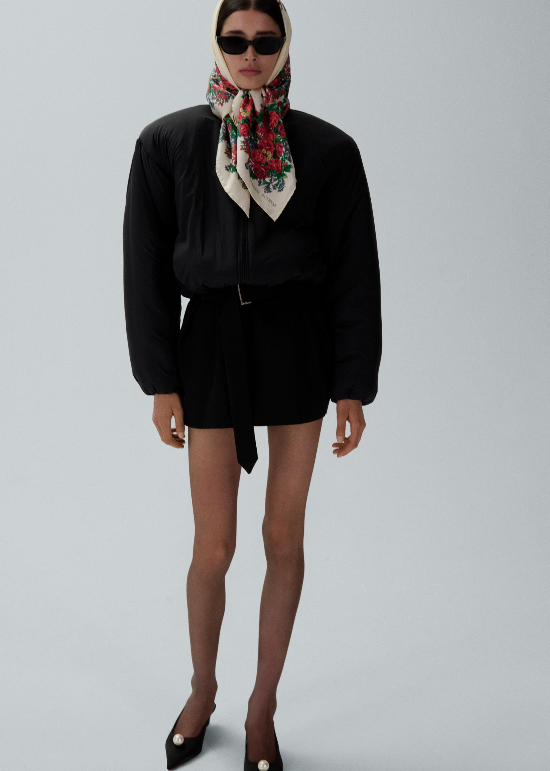 Belted mini skirt in black Product Image