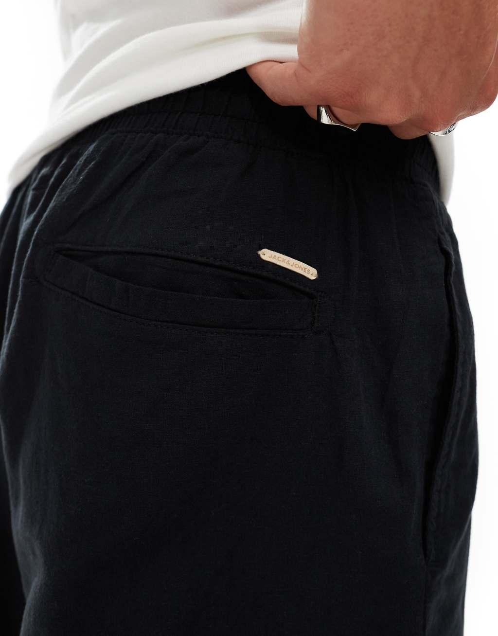 Jack & Jones tapered linen blend pants with cargo pockets in black Product Image