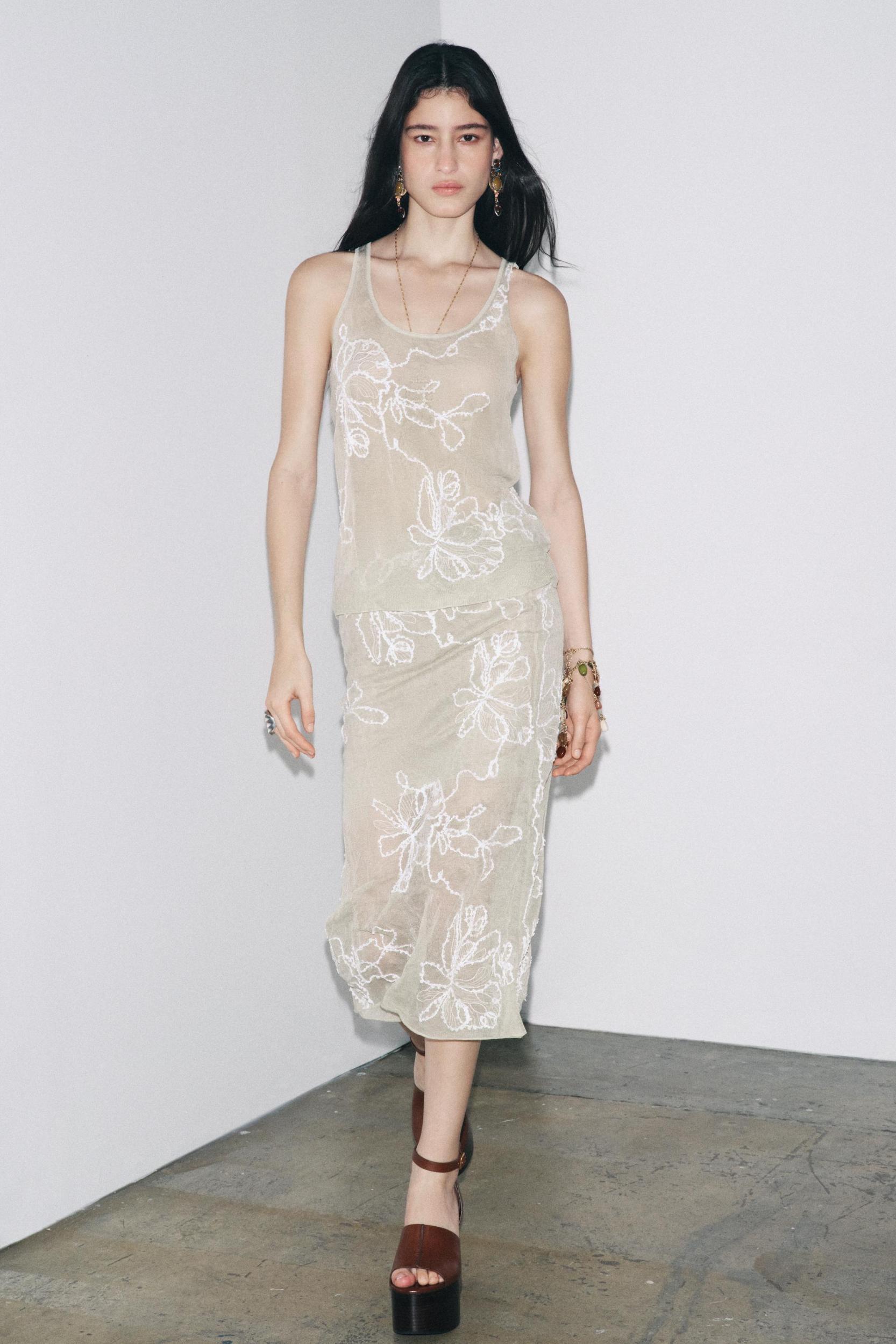 SEMI-SHEER STRUCTURED KNIT TOP Product Image