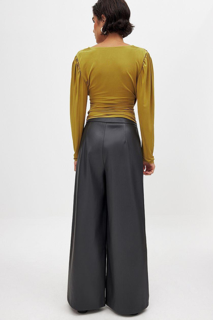 Mid Waist Wide Leg Pleated PU Trousers Product Image