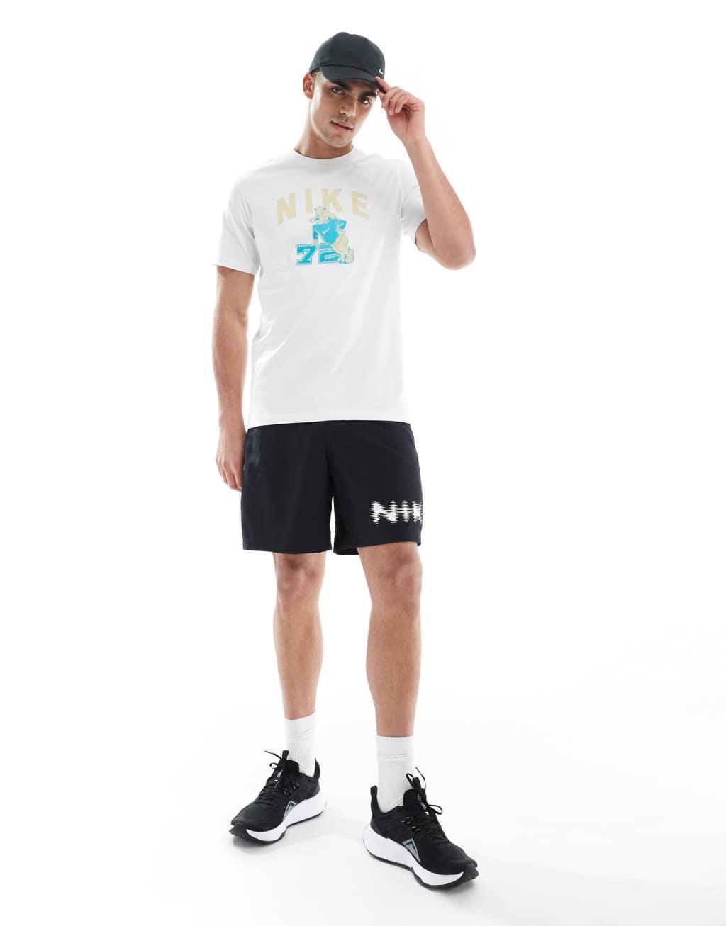 Nike Training blurred swoosh graphic 7 inch shorts in black Product Image