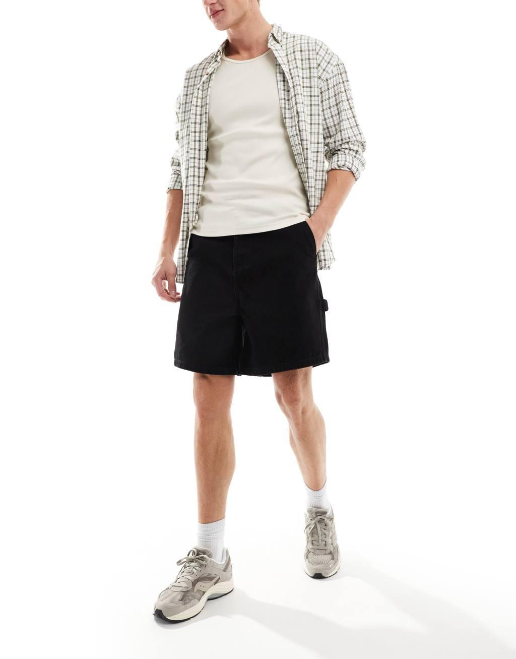 ASOS DESIGN standard length denim jorts with carpenter detail in mid wash blue Product Image