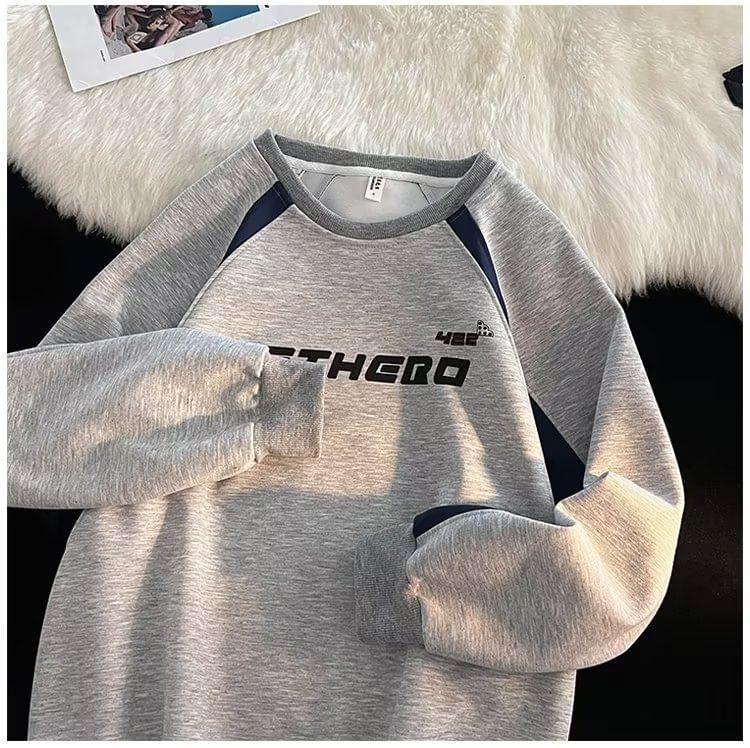 Raglan-Sleeve Round Neck Lettering Sweatshirt Product Image