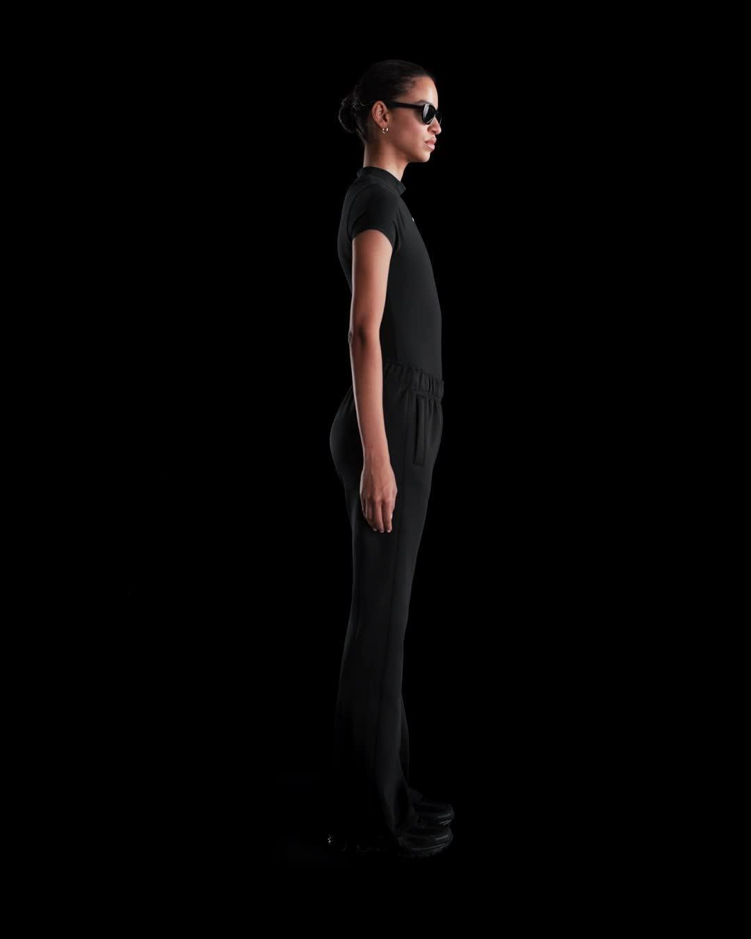 Women's Nike Sportswear Windrunner Mid-Rise Slim Knit Pants Product Image