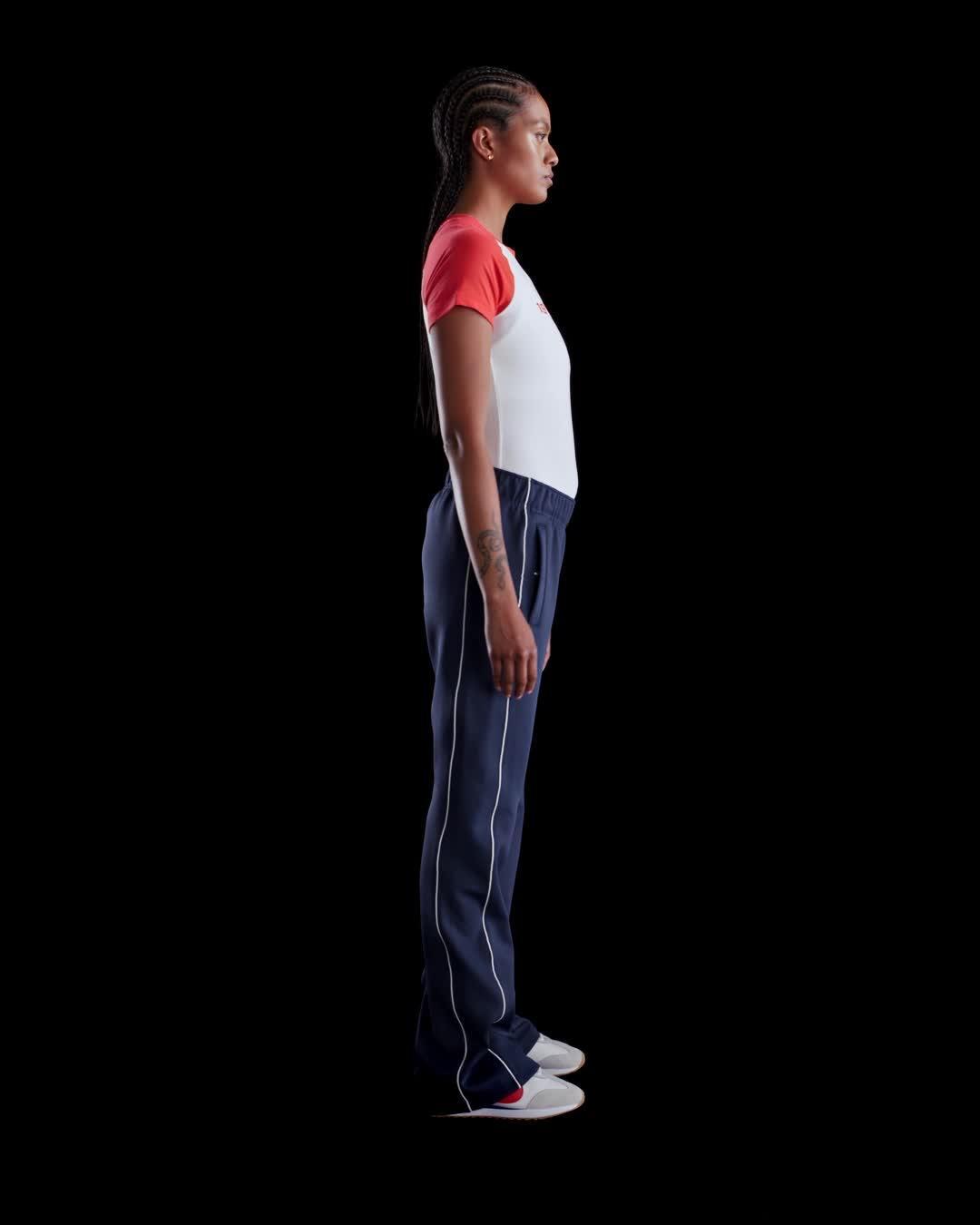 Women's Nike Sportswear Windrunner Mid-Rise Slim Knit Pants Product Image