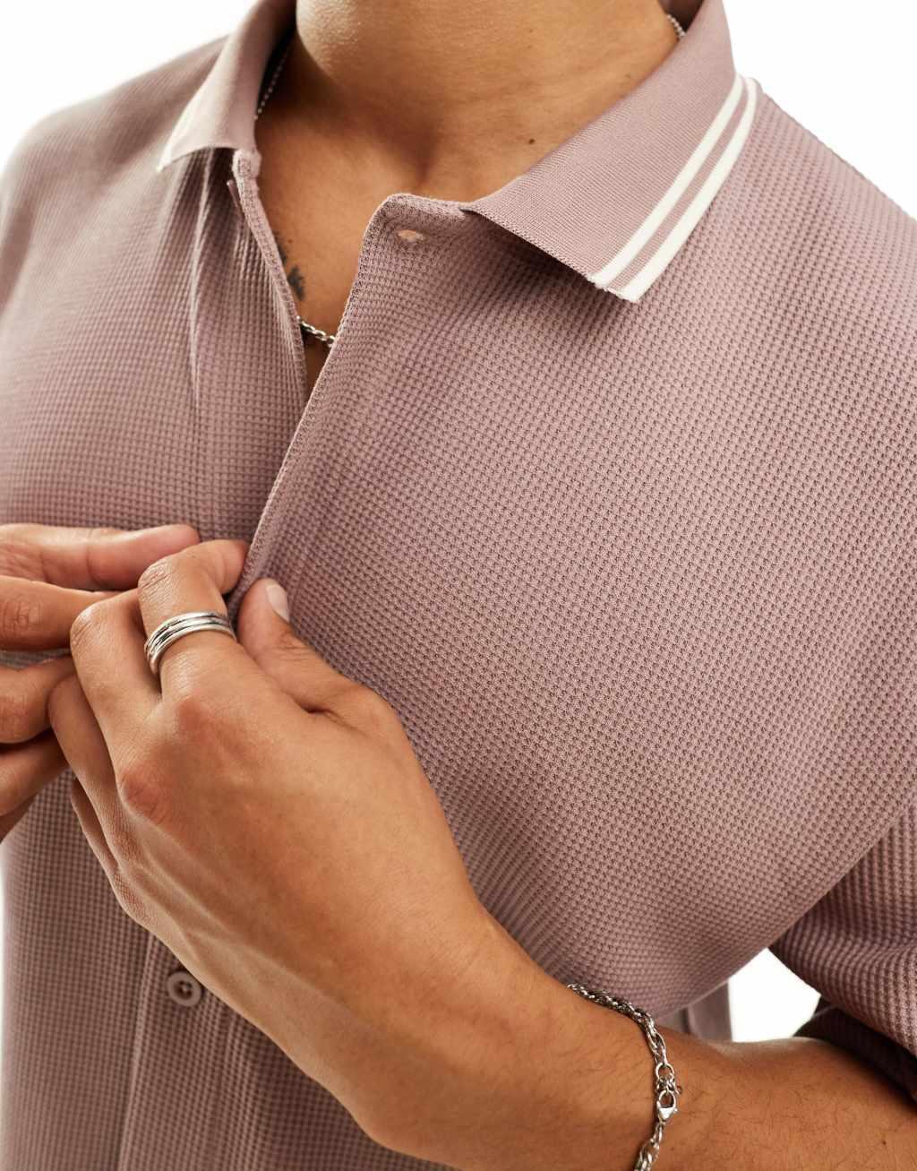 ASOS DESIGN relaxed button-up polo shirt in pink Product Image