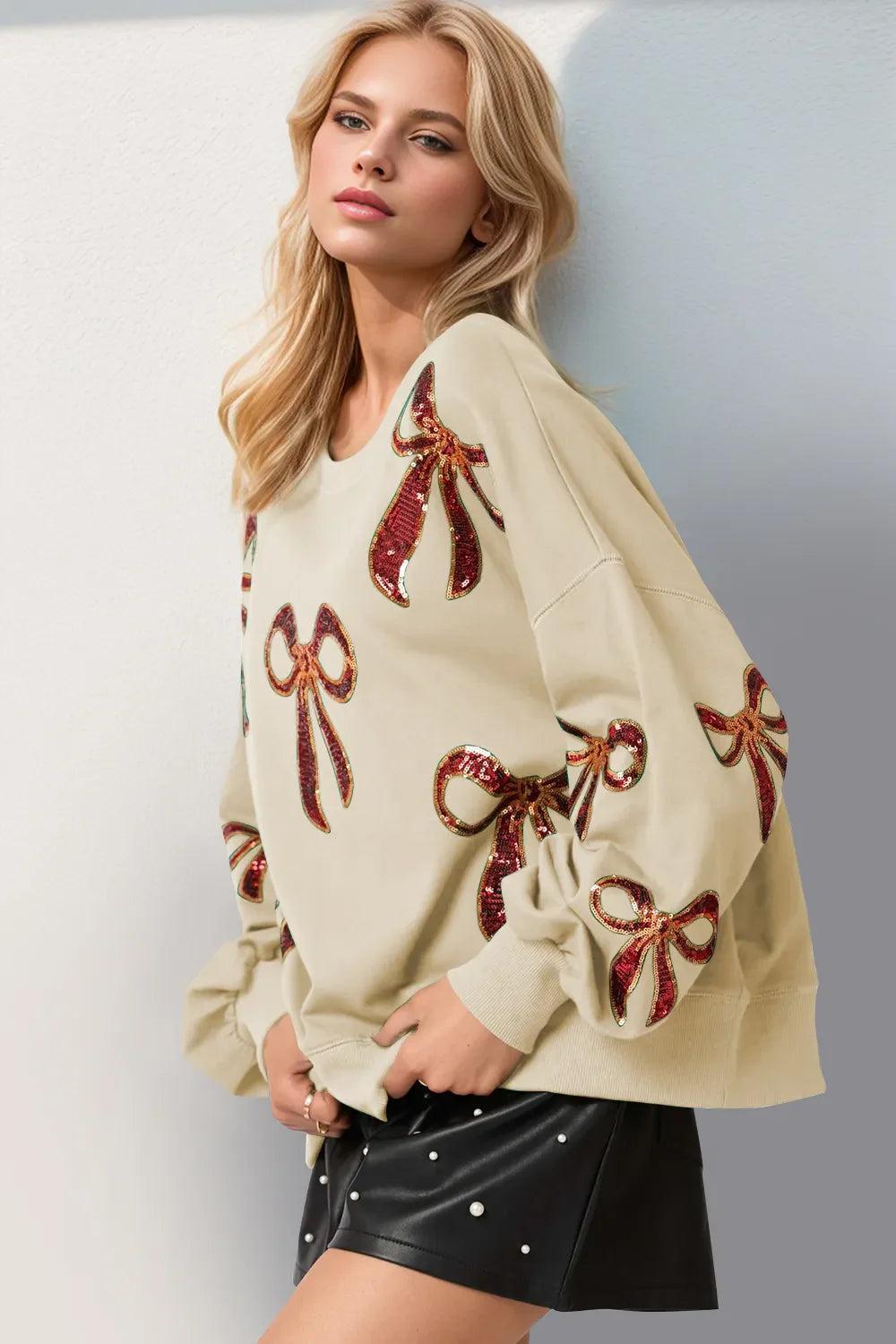 Double Take Christmas Bow Sequin Round Neck Dropped Shoulder Sweatshirt Product Image