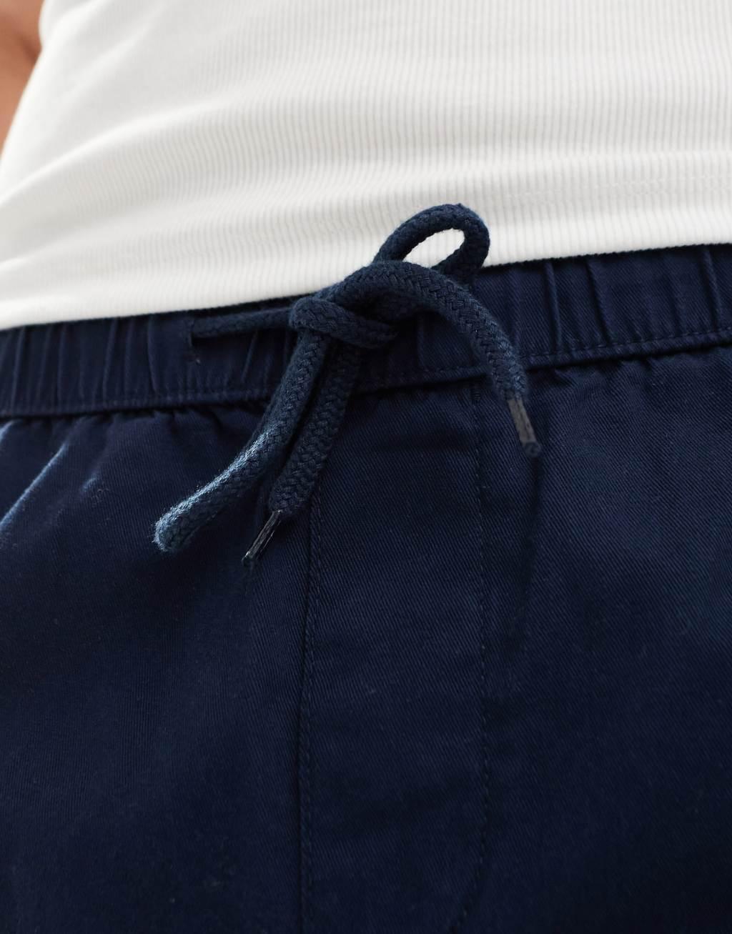 ASOS DESIGN slim chino shorts in navy Product Image