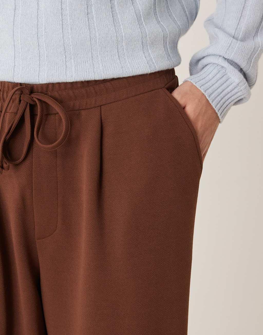 ASOS DESIGN super baggy soft tailored pants with pleat front in brown Product Image