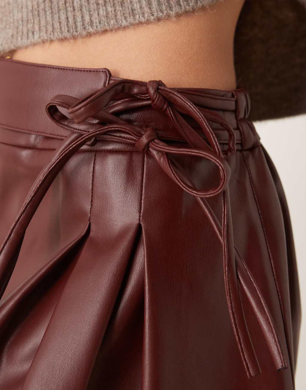 ASOS DESIGN leather look pleated mini skirt in burgundy Product Image