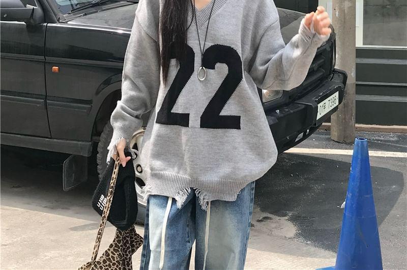 Long-Sleeve V-Neck Numbering Knit Top Product Image